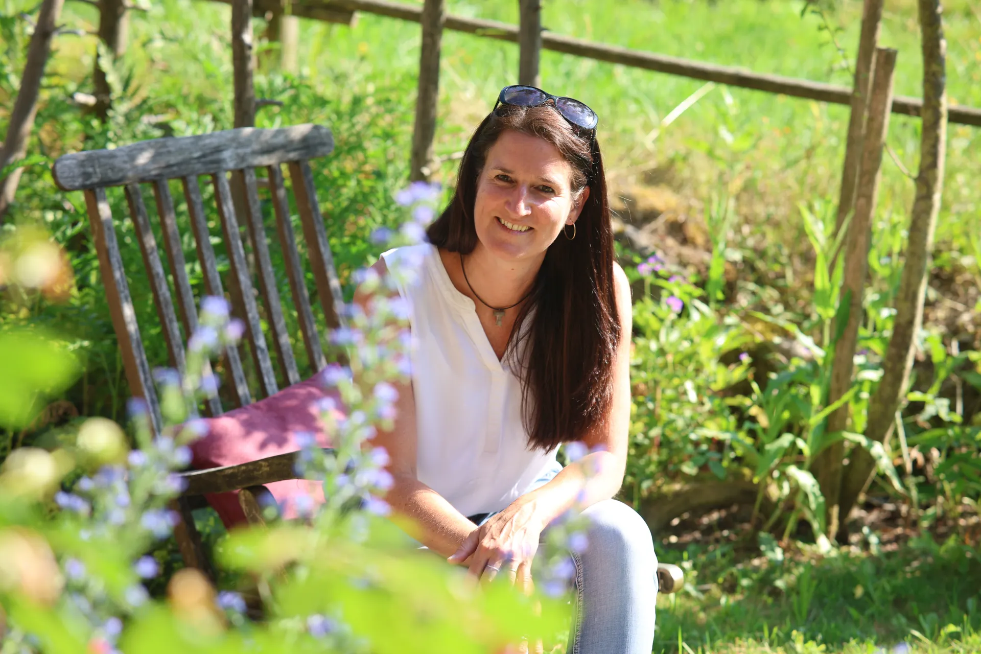 Monika Angerer sitting in a garden